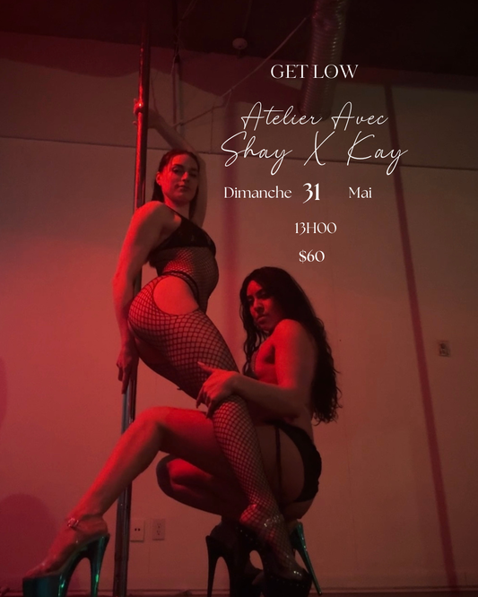 Two person doing pole dancing in a pole dance studio in Brossard