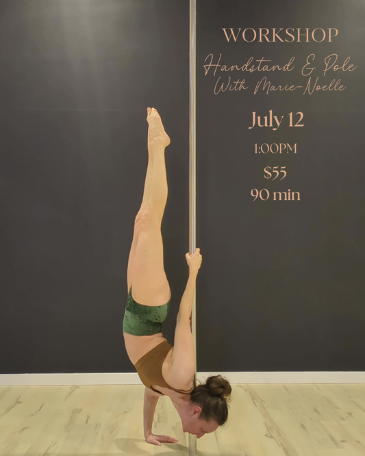 Person doing a handstand on a pole in a pole dancing studio in Brossard.
