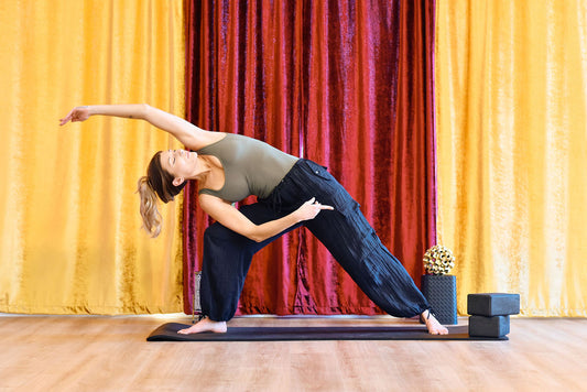 A person doing yoga in a yoga studio in Brossard